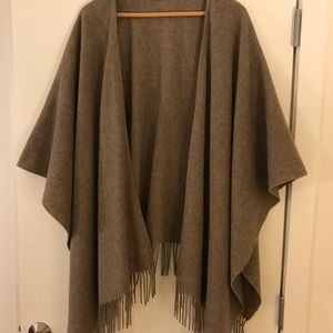 Light brown wool poncho with fringe trim